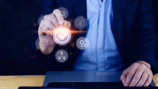 istock Quality management with Quality assurance or QA and Quality control or QC and improvement. Standardization and certification concept. compliance to regulations and standards. concept with manager. 1447221329