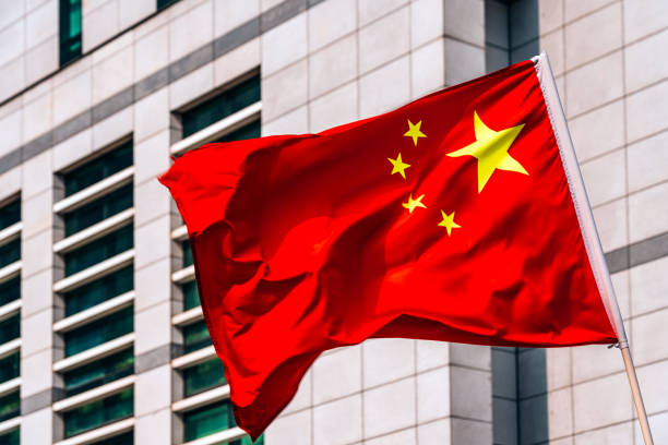 Chinese flag waving in China stock photo