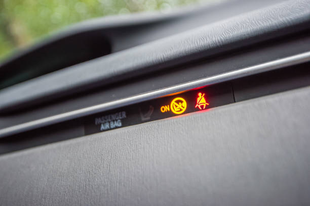 istock Seatbelt light showing on the black background 1447224808
