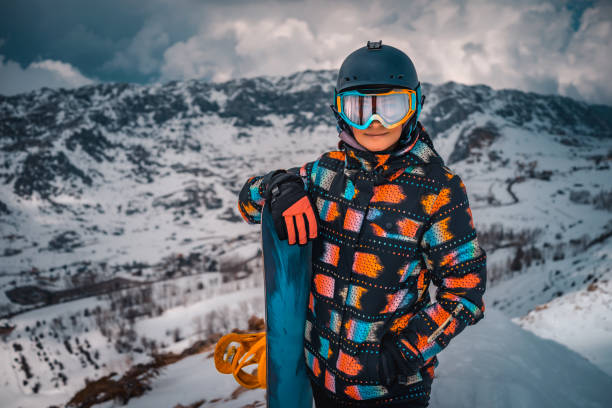istock Happy Snowboarder Girl 1447231942