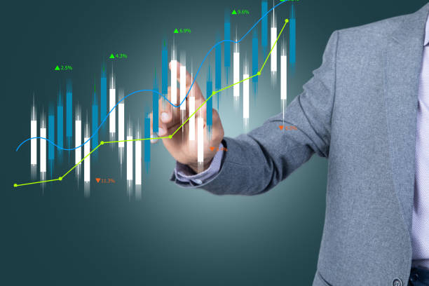 istock Candlestick chart. Businessman clicks on the screen 1447233281