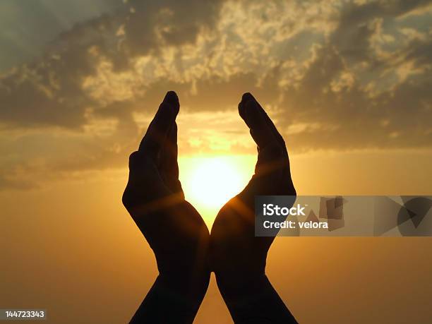 Sun In Hands Stock Photo - Download Image Now - Glowing, People, Bright