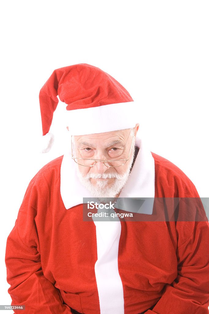 Intrattabile Santa lampante nella telecamera, isolato su sfondo bianco - Foto stock royalty-free di 60-69 anni