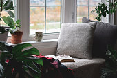 istock Cozy reading nook by a window 1447240013