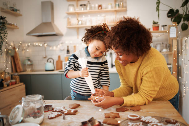 istock Putting final touch on our Christmas cookies 1447243885