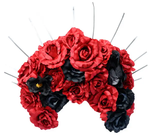 Large wreath of decorative textile red and black roses. Headpiece for a costume for a holiday