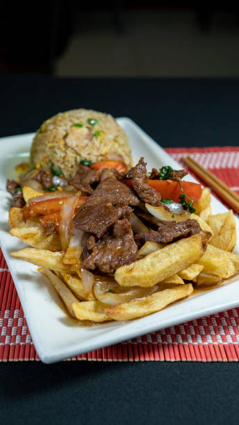 istock lomo saltado with chaufa rice, fine beef tenderloin. peruvian food 1447247802