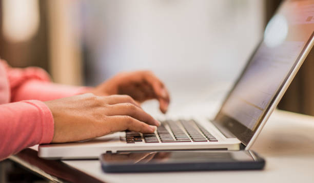 istock Young woman in office administrative work 1447247843