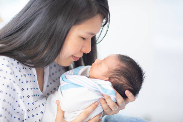 istock Mother with Her Newborn 1447247946