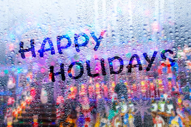 istock Happy Holidays words on a rainy windowpane 1447254413