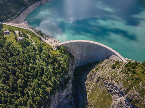 hydro electricity, renewable green energy from water dam, Alps