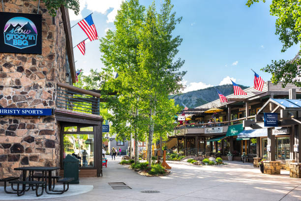 Snowmass village, Aspen with shopping mall in Colorado downtown with sports store and Sotheby's real estate stock photo