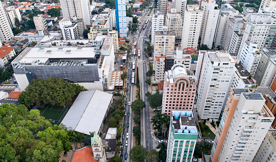 Aerial view of Nove de Julho avenue, commercial and residential buildings in the downtown in Sao Paulo city,  Brazil.