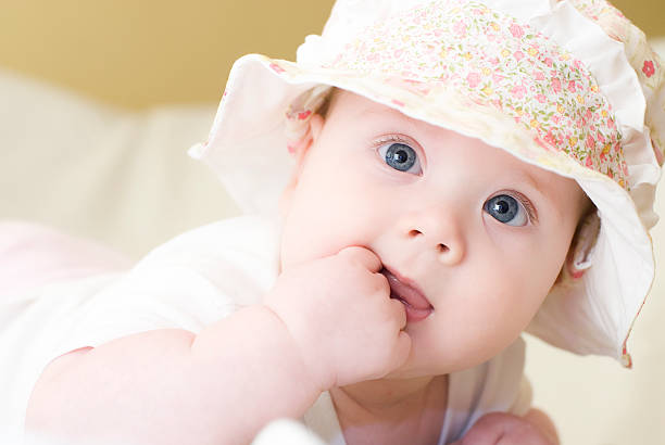 Girl sucking he finger stock photo