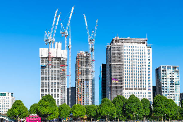 South Bank cityscape by Thames river with construction of flats apartment buildings in London London, United Kingdom - June 22, 2018: South Bank cityscape by Thames river with construction of skyscraper flats apartment buildings waterloo bridge stock pictures, royalty-free photos & images