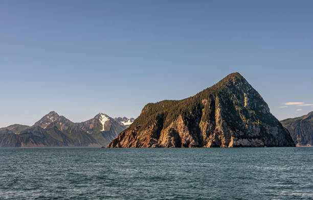 istock Isolated triangular Hive Island, Resurrection Bay, Alaska, USA 1447257070