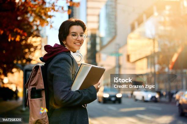 Happy Female University Student In The City Looking At Camera Stock Photo - Download Image Now
