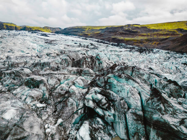 istock Dirt covered ice on the glacier in Iceland 1447259266