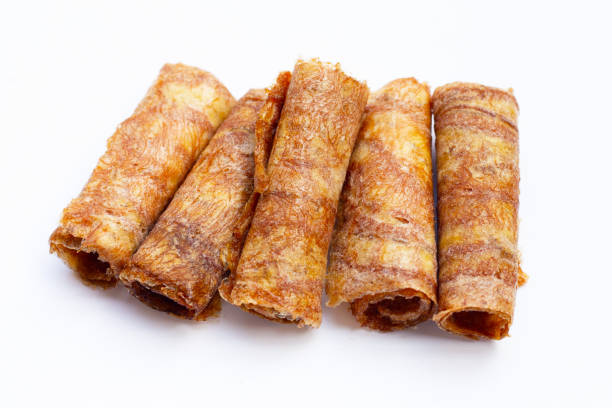 istock Sun dried banana roll snacks 1447264276