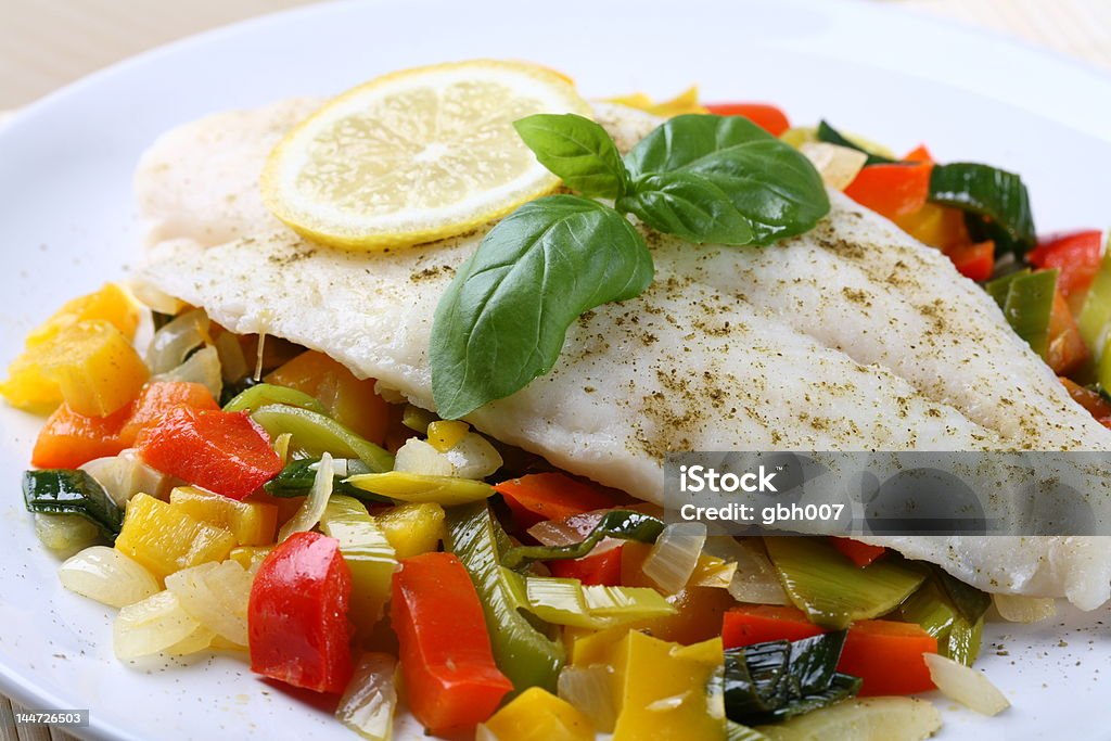 Boiled fish Boiled fish with vegetables Appetizer Stock Photo