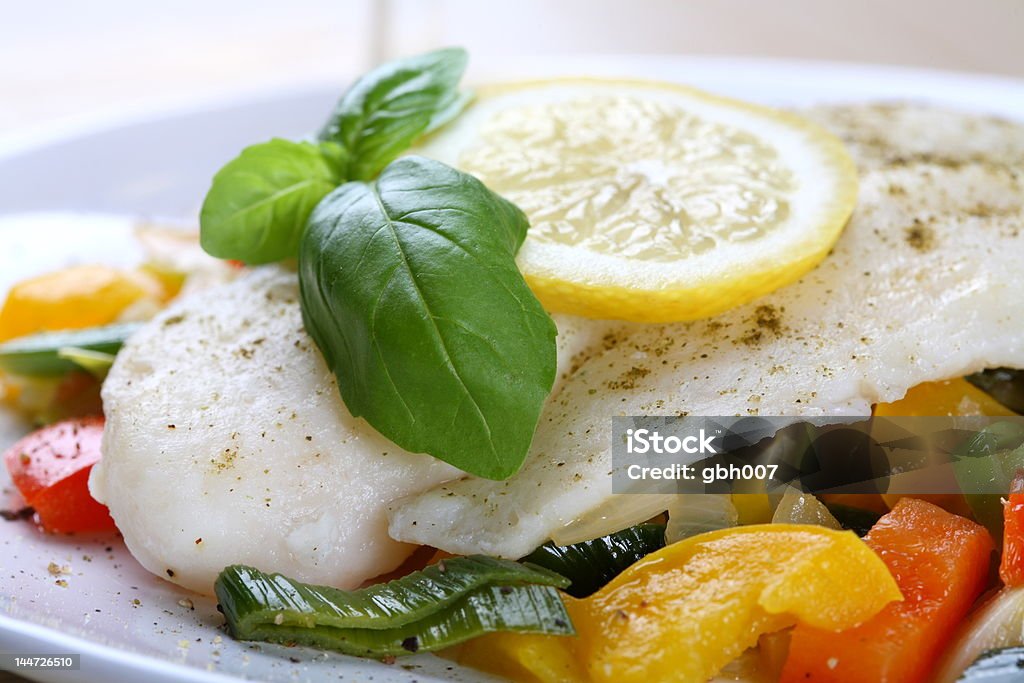 Boiled fish Boiled fish with vegetables Appetizer Stock Photo