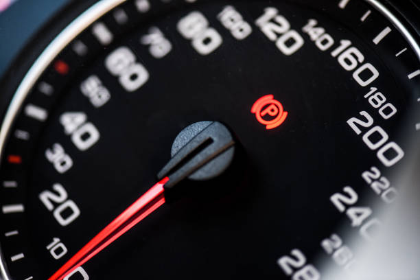 istock handbrake icon on the dashboard. Modern light car mileage. 1447269859