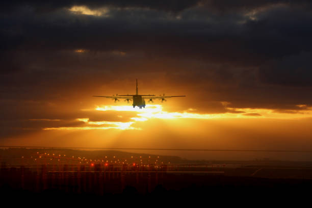 istock Plane lands at an airfield at the sunset 1447269992