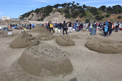 10-15-2022:San Francisco, California: SandKastle tournament in San Francisco. People making sand scultpures on ocean beach