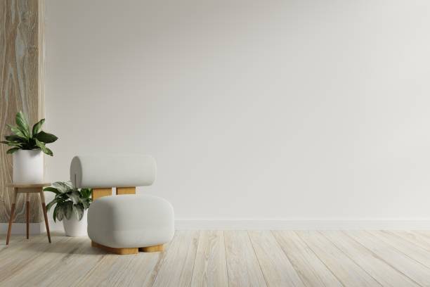 istock Modern minimalist interior with a gray armchair on empty white wall background. 1447284934