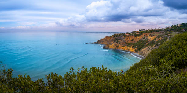 istock Vincente Bluffs Reserve tranquil seascape and cloudscape over the Pacific Ocean 1447285030