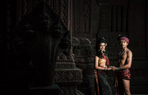 istock Young Actor and Actress wearing beautiful ancient costumes 1447285155