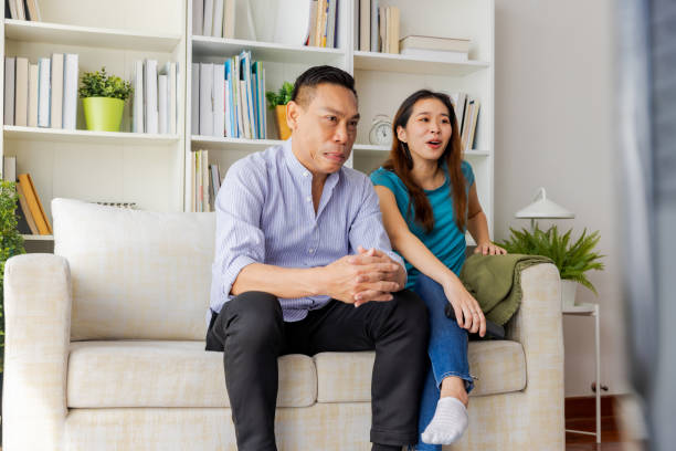 istock Friends enjoy watching media at home together. 1447288566