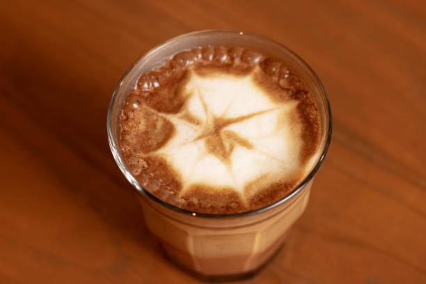 Cup of Coffee on wooden table in café shop
