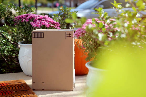 istock Parcel (box)  delivery at the front  door outside. 1447296162