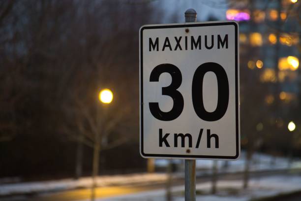 A 20 Km/h speed limit sign in Panama City with the city skyline as background