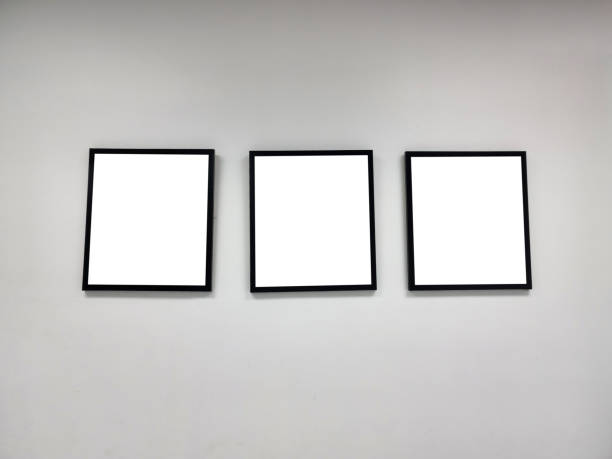 istock Blank picture frame on the wall. 1447300137