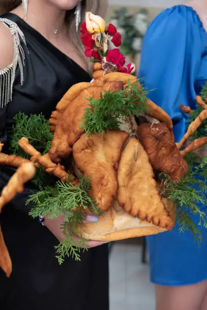 Photo of Gaina, Romanian traditions, Godparents chicken at wedding in Romania ,2022