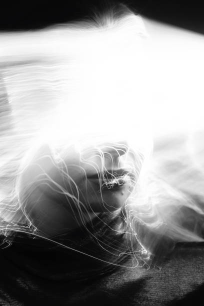 istock Abstract woman studio portrait with light painting technique 1447301344