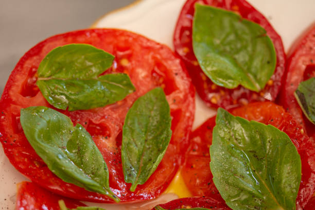 tomato with basil leaf