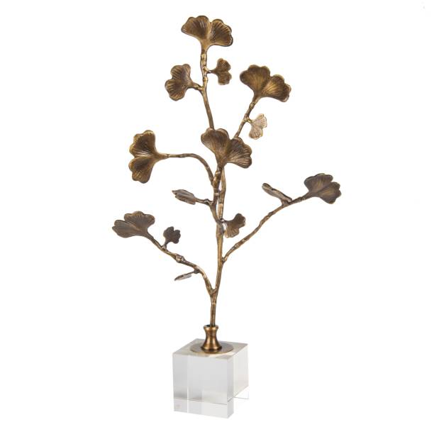 istock Metal statue of a tree on a marble stand on a white background - decoration for an interior 1447307421