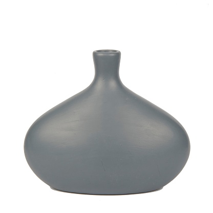 A minimalistic gray ceramic convex vase on a white background - decoration for an interior