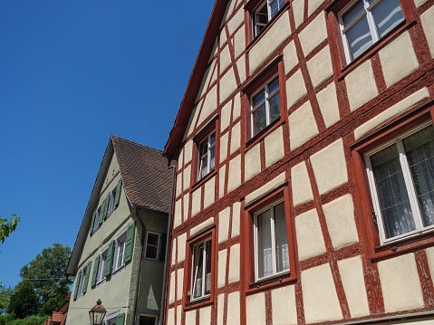 Old historical houses in Essen Werden. House in center of row houses has dormers. All are ha;f-timbered