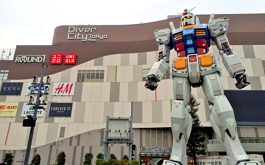 tokyo, Japan – January 04, 2022: A low-angle shot of the Unicorn Gundam Statue in Tokyo Metropolitan, Japan