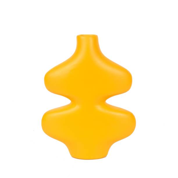 Abstract yellow ceramic vase with curve outlines - interior decoration