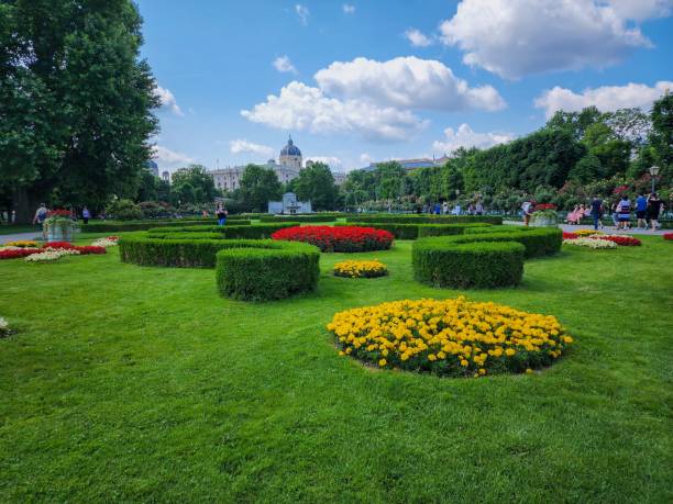 istock Crowded scenic Volksgarten on a sunny day in Vienna, Austria 1447310431