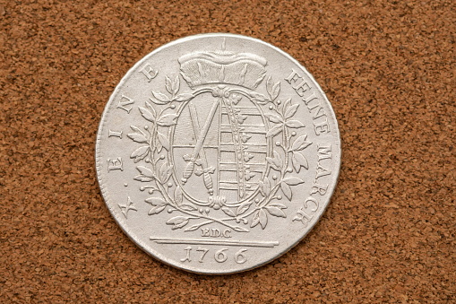 A silver coin of the 19th century Russia with a nominal value of one ruble 1827