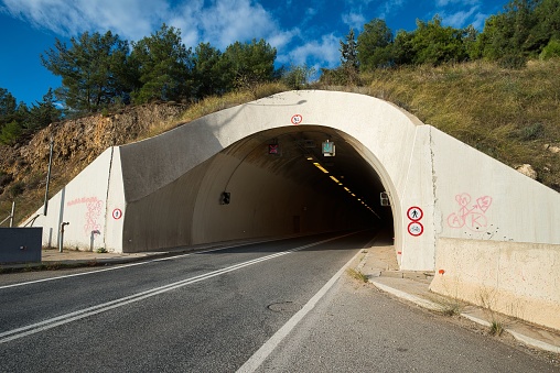 Tunnel on a road along the city of Volos, Greece.