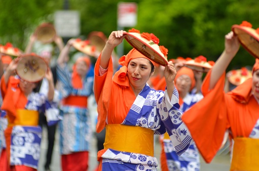 New York, United States – May 14, 2022: The dancers from Japanese Folk Dance Institute of New York attending Japanese day parade, USA