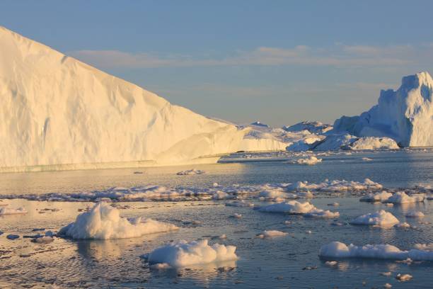 istock Icebergs floating in ocean in Ilulissat, Greenland 1447313657