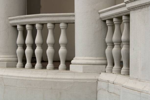 istock Closeup of classical white baluster as a fence wall 1447313768